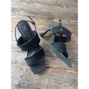 Cozy Island black denim
Tweed heeled sandals NWOT size 9.5